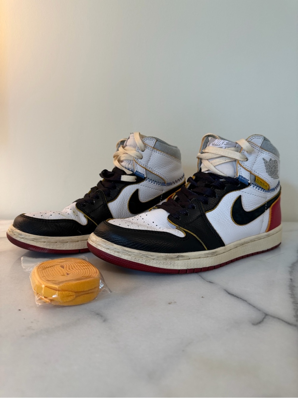 Nike Women’s High-Top Sneakers in White Black and Red